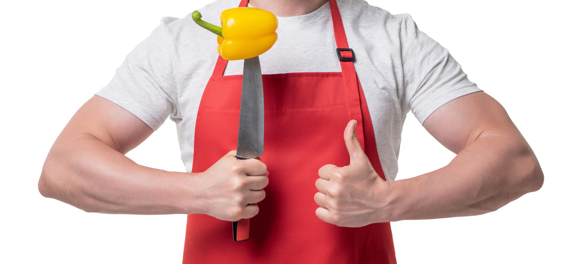 Instructor demonstrating a knife technique to students